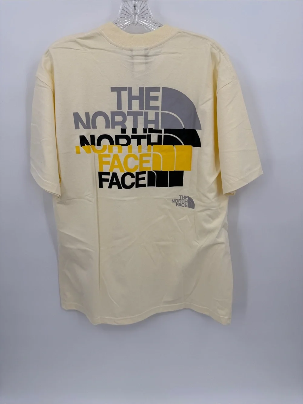 The North Face Cream Graphic 'Never Stop Exploring' Tee
